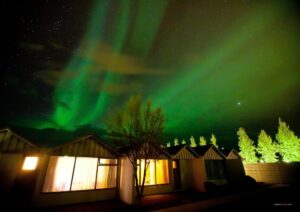 The Northern Lights over the Hill Hotel in Iceland