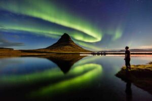 The Northern Lights by Kirkjufell mountain in Iceland