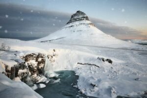 Kirkjufell mountain in Iceland covered in snow during winter