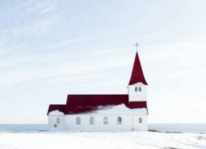Vík church covered in snow in Iceland during winter
