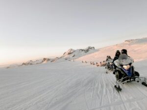 Snowmobiling across a glacier in Iceland