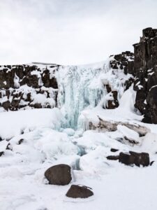Öxarárfoss waterfall in Iceland's Golden Circle during winter