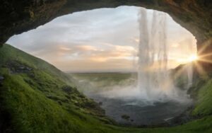 Seljalandsfoss waterfall in Iceland from behind the waterfall during summer