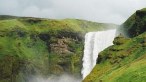 Skogafoss waterfall from the side during summer in Iceland