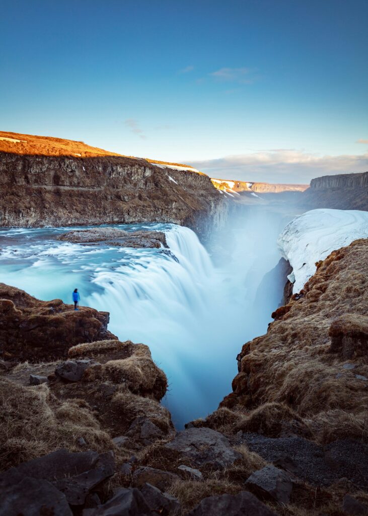 Gullfoss waterfall under a clear blue sky in Iceland during summer
