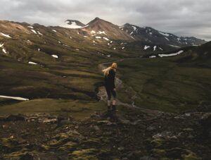 A hiker standing in the midst of the Icelandic Highlands during Iceland's National Day