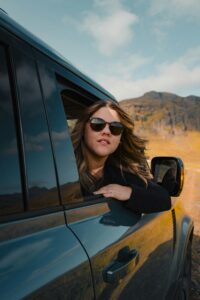 A couple taking a road trip adventure in Iceland