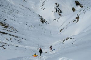 A family going for a hike in the snow in Iceland