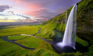 Seljalandsfoss waterfall in Iceland under the Midnight Sun