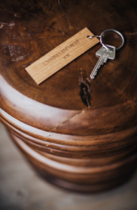 A superior room with a key resting on a table in the Hill Hotel in Flúðir