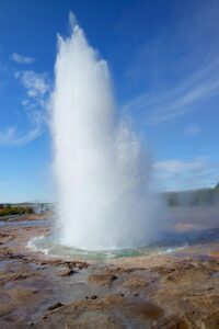 Strokkur geyser erupting in Iceland's Golden Circle during August