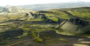 A hiking route in Iceland during August in amongst old lava fields