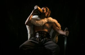 A Viking drinking beer in the old days in Iceland