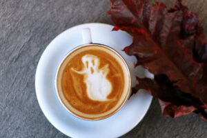 A ghostly gaul in the foam of a capuccino coffee 