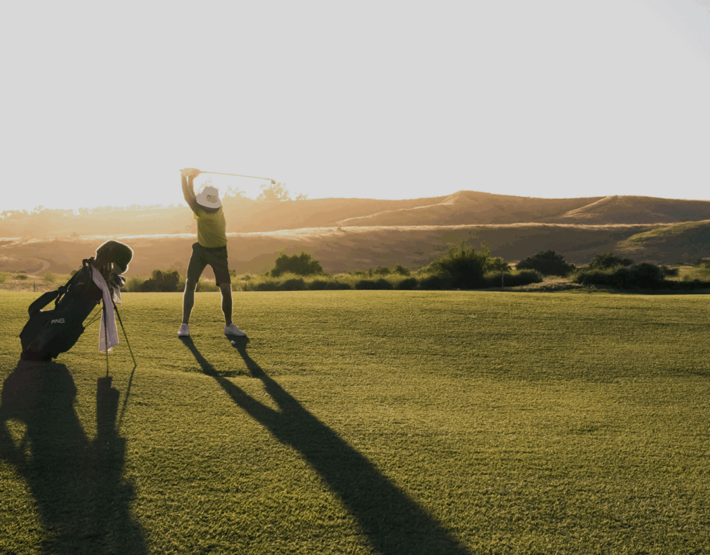 A man playing golf in Flúðir in Iceland