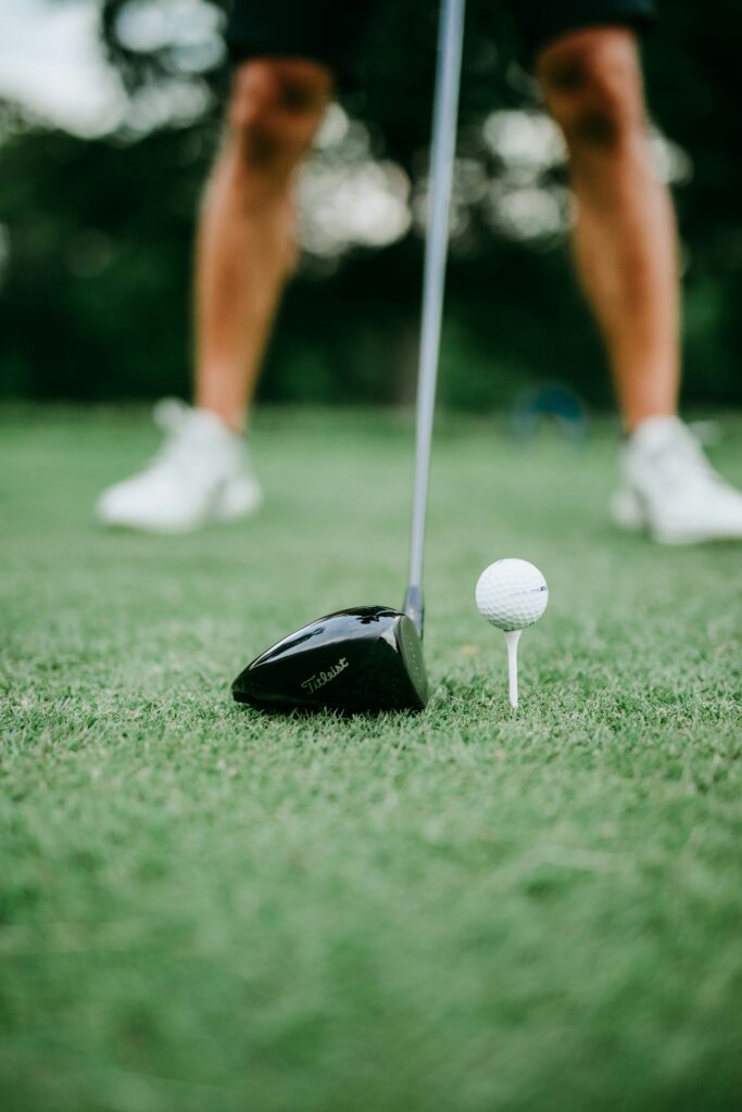 A man teeing off in Iceland